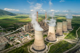 Fototapeta Sport - Aerial view the plant producing electrical energy with large pipes at Kozani in northern Greece.