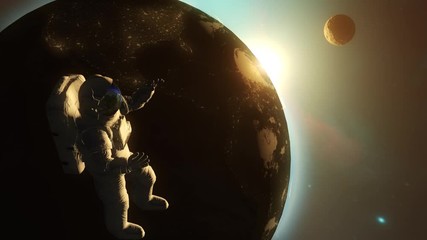 Wall Mural - astronaut in outer space against the backdrop of the planet earth.