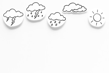 Wall Mural - modern weather icons set on white background top view copy space