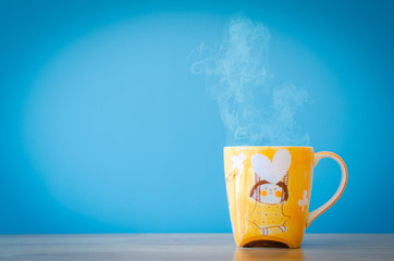 beautiful tea cup on blue background,select focus.