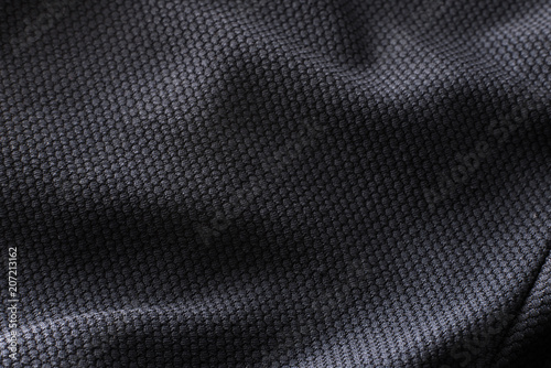Close-up polyester fabric texture of black athletic shirt Poster Mural XXL