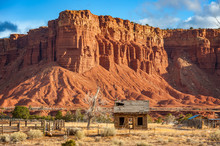 American Southwest Desert Landscape. Classic Eroded Navaho Sandstone Bluffs And Blue Skies Bring Up An Image Of The Old West. This Is Especially True Here In Torrey, Utah, Near Capitol Reef Park.