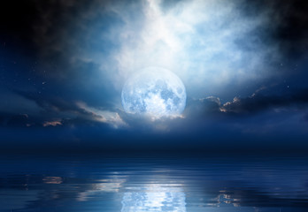 night sky with moon in the clouds 