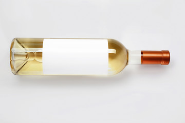 Sticker - Bottle of delicious wine with blank label on white background