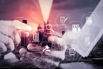 Poster - close up of businessman hand working with smart phone and laptop and digital tablet computer in modern office