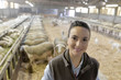 © goodluz - Portrait of smiling sheep breeder in barn