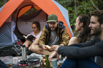friends camping in the forest together