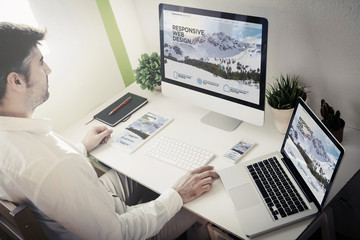 Poster - man working with responsive devices