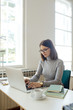 © LStockStudio - Beautiful Woman Holding Tablet