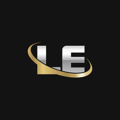 Initial letter LE, overlapping swoosh ring logo, silver gold color on black background