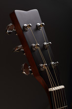 Six-stringed Acoustic Guitar Head With Tuning Pegs Close-up