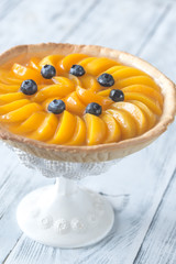 Wall Mural - Tart with peaches and blueberry