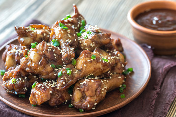 Wall Mural - Chicken teriyaki wings with barbecue sauce