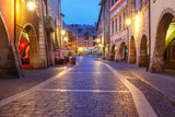 Fototapeta Uliczki - Nice street Rue Sainte-Claire in Old Town of Annecy at rainy night, France