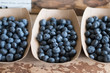 © Kristen Loken - Farm fresh organic blueberries in Kraft paper baskets