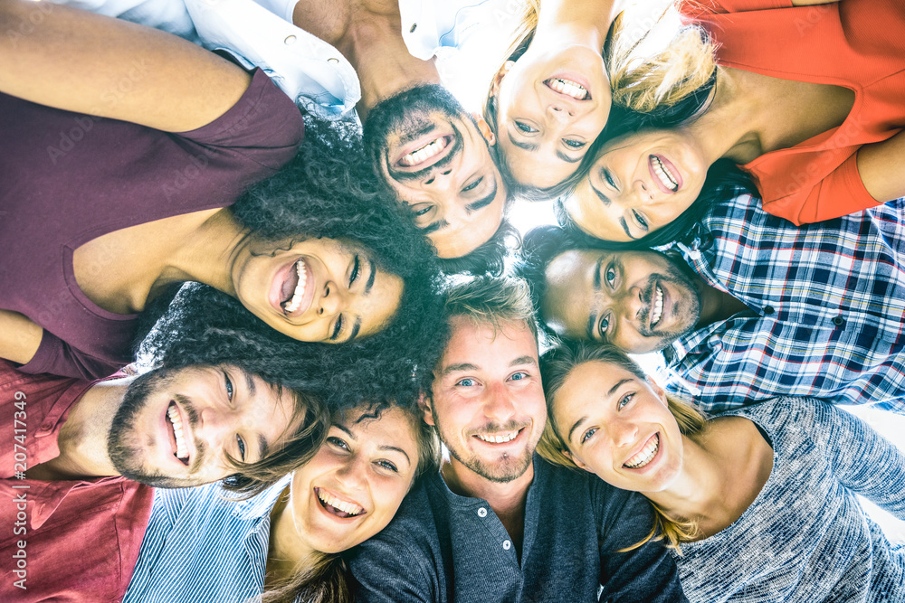 Multiracial best friends millennials taking selfie outdoors with back lighting - Happy youth friendship concept against racism with international young people having fun together - Azure filter tone - obrazy, fototapety, plakaty 