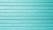 Plastic siding wall texture in cyan color.