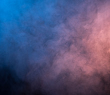 Abstract Blue And Pink Smoke On A Dark Background