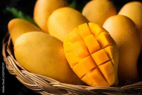 Plakat Yellow Mango Beautiful skin In the basket Blackboard background