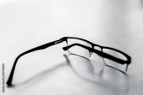 Fotografía Black colored half frame rim reading glasses or spectacles to cure eye disease myopia