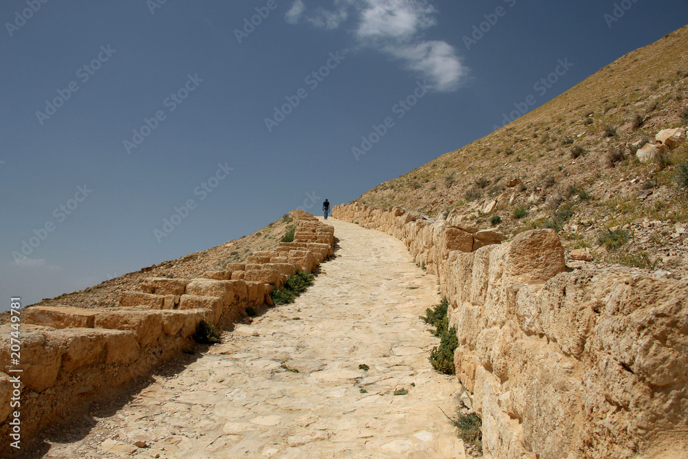 Road Execution Road to the Machaerus and Herod Castle ruins, Jordan. Place of ...