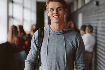 Young male student in college campus