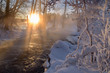 Freezing winter morning at Kuusaankoski rapids. Sun is rising. Temperature -22 °C. Laukaa, Finland.