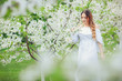 © Volodymyr Shcherbak - Close up romantic portrait of beautiful elegant woman in blossom spring trees.