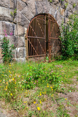 Poster - Large iron gate into the ramparts