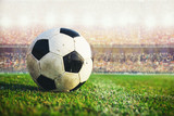 Fototapeta Sport - soccer ball in the stadium