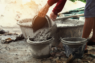 Wall Mural - worker pouring cement mix concrete in tray