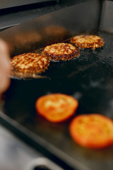 Wall Mural - Cooking Burgers.  Meat And Buns Roasting On Grill 