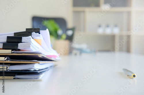 Fotografie, Obraz Stack of paper files and pen business equipment on office table.