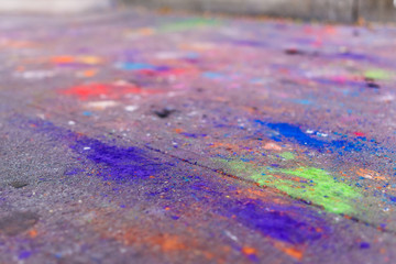 Macro closeup of colorful chalk art on ground with purple, blue and green colors on asphalt street sidewalk in urban New York City, Manhattan graphic resource colors