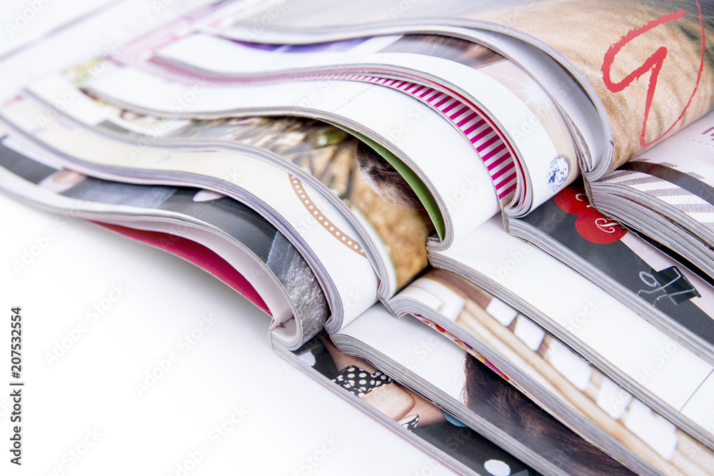 Stack of magazines isolated on white background Stock Photo | Adobe Stock