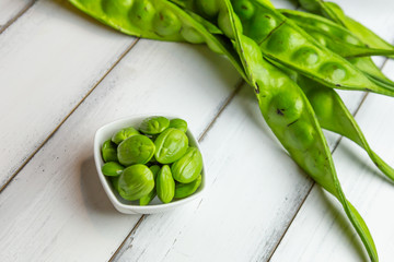 Sticker - Petai, Bitter Beans on wood table, Thai vegetable food, Parkia speciosa seeds