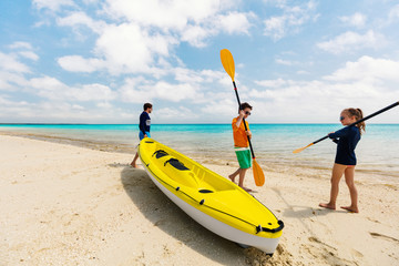 Poster - Family kayaking at tropical ocean