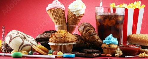 Fotomural Unhealthy products. food bad for figure, skin, heart and teeth.
