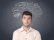 © ra2 studio - Young casual businessman with drawn speech bubbles over his head