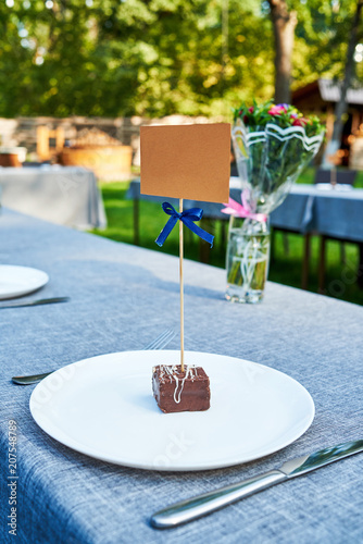 Wedding Table Setting With Blank Guest Card On Empty White Plate