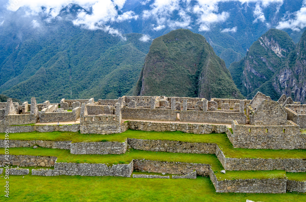 Stone built terracing and buildings at Machu Picchu, an ancient Inca ...