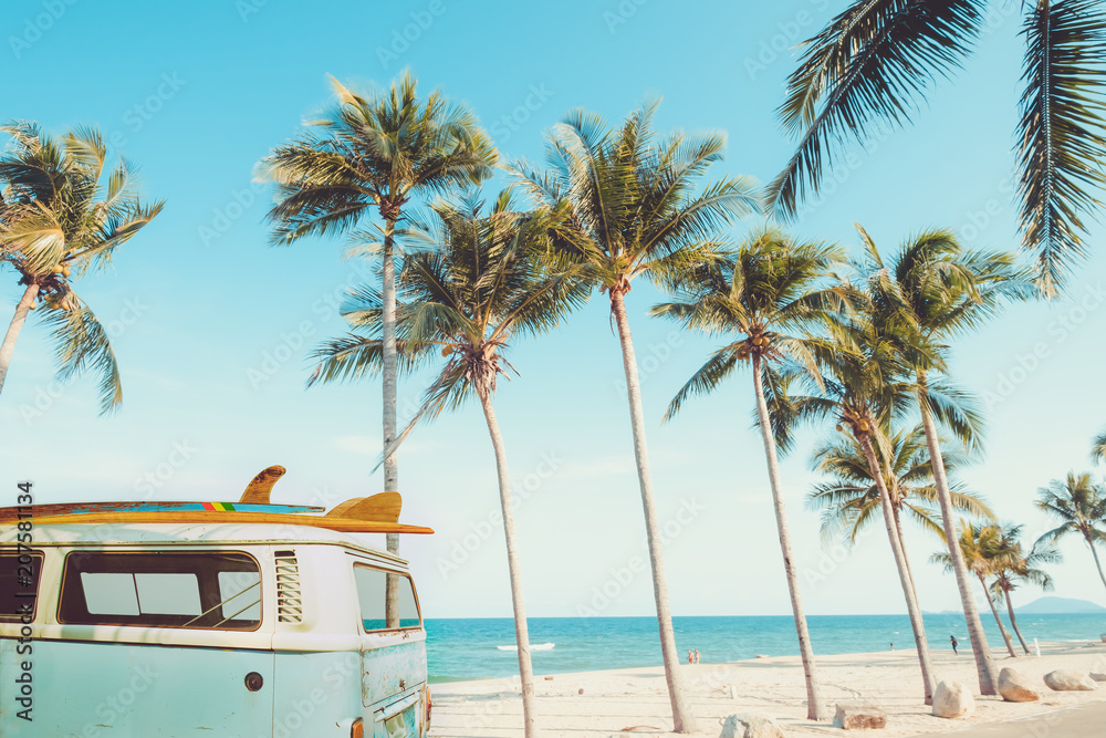 vintage car parked on the tropical beach (seaside) with a surfboard on ...