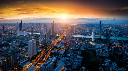 Wall Mural - aerial view of bangkok skyline panorama and skyscraper with light trails on sathorn road center of b