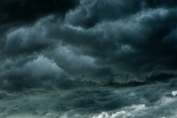 Wall Mural - dark clouds and thunderstorm with rainy, dramatic black clouds in summer