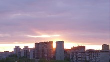 Beautiful Sunset On Background Multi Storey Building In City Timelapse.
