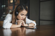 © SP56 - sad woman relaxing by listening song with earphones and smartphone.