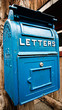 Traditional Old Blue mail letter box