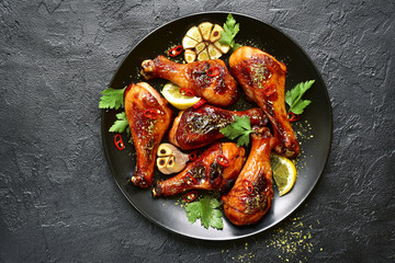 Wall Mural - Roasted spicy chicken legs.Top view with copy space.