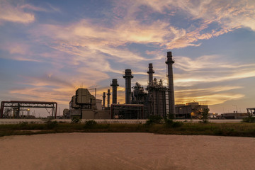 Wall Mural - Gas turbine electrical power plant at dusk with twilight support all factory in industrial Estate