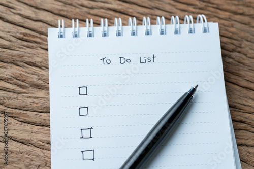 Task checkmark, To Do List checkbox written with pen on white paper notepad on w Poster